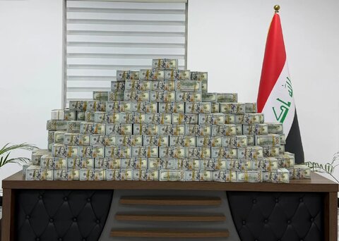کوهی از دلار کشف شده در پرونده فساد مقام نفتی عراق